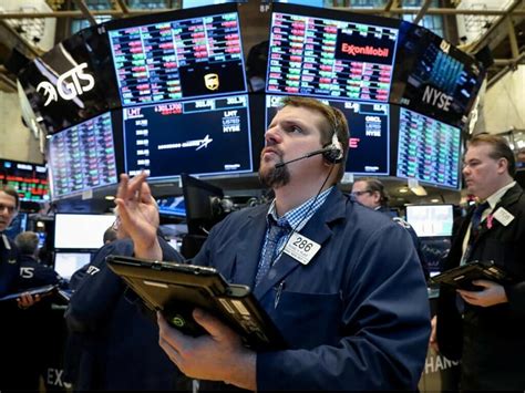 Stock market today: Wall Street ticks higher as stocks worldwide climb